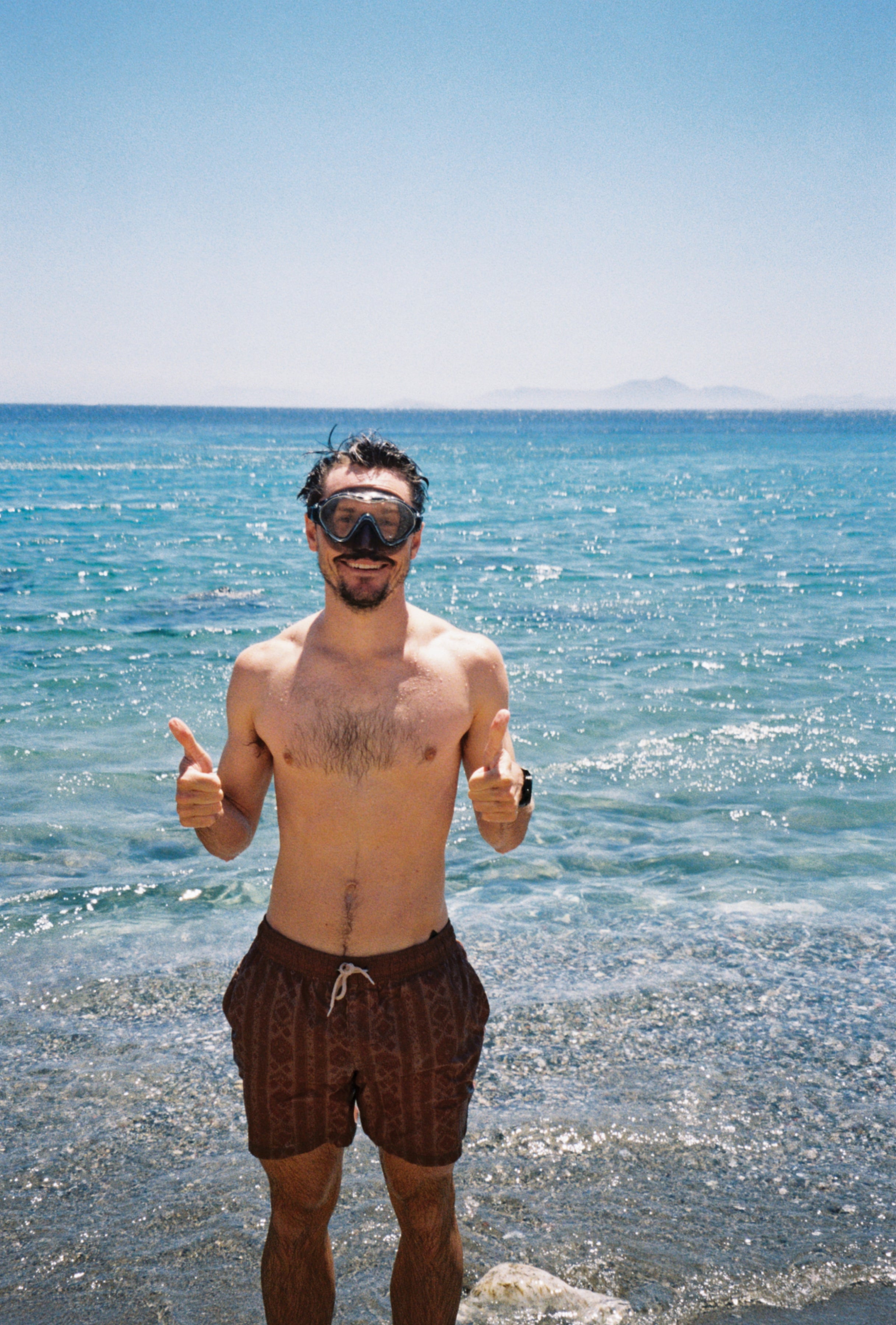 Perreniel Founder in water with thumbs up